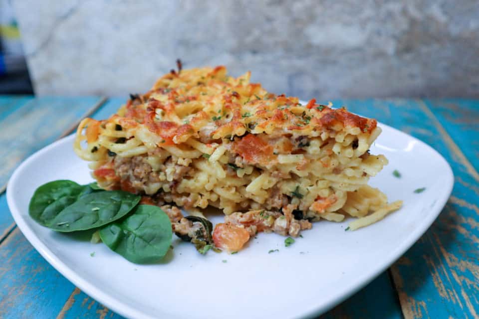 Picture of finished Spinach and Sausage Spaghetti Pie on a plate.