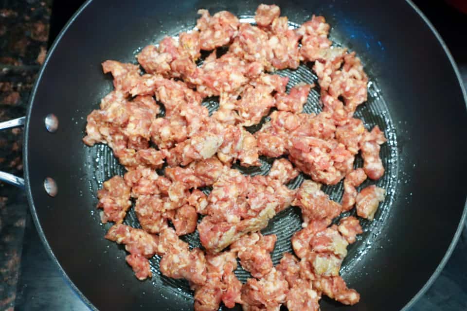 Picture of cooking sausage for Spinach and Sausage Spaghetti Pie.