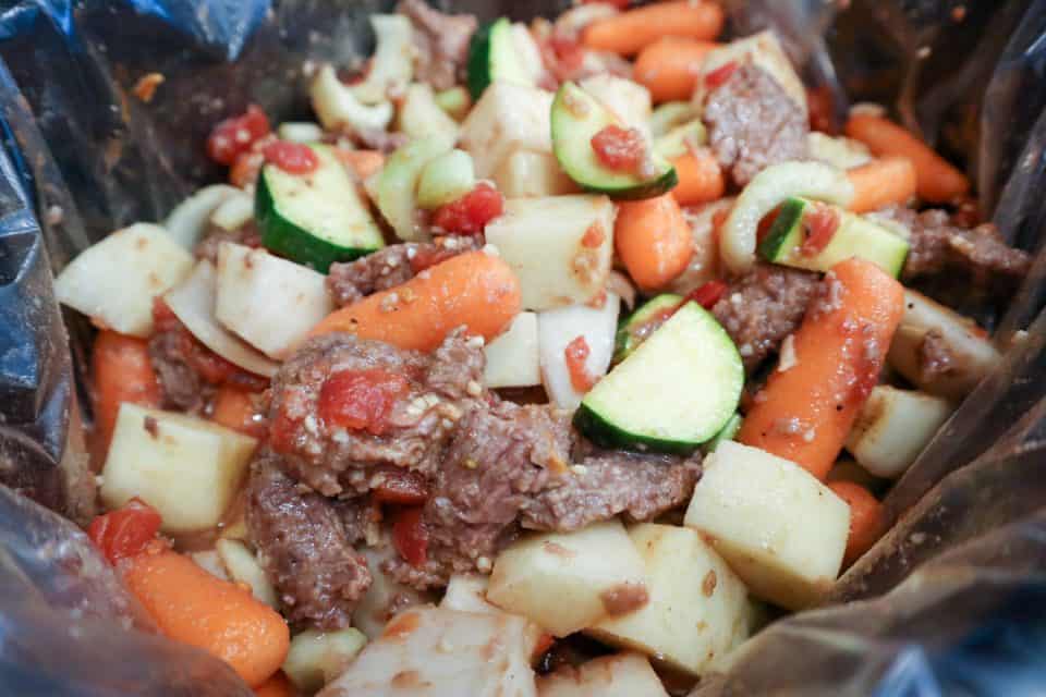 Picture of combined Hearty Slow Cooker Beef Stew ingredients before cooking in slow cooker.
