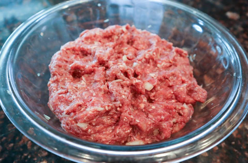 Mixed meat mixture for Simple Weeknight Meatloaf in a bowl.