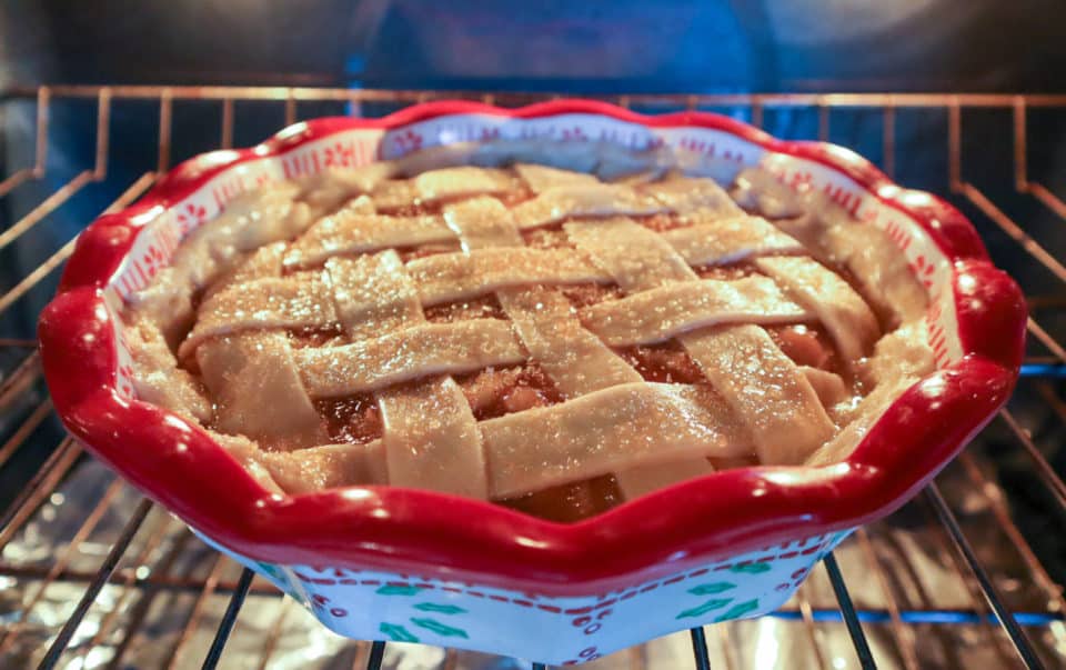 Caramel Apple Pie baking in the oven.