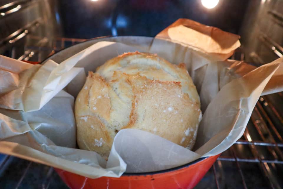 Rustic Dutch Oven Bread halfway through the baking time with cover removed.