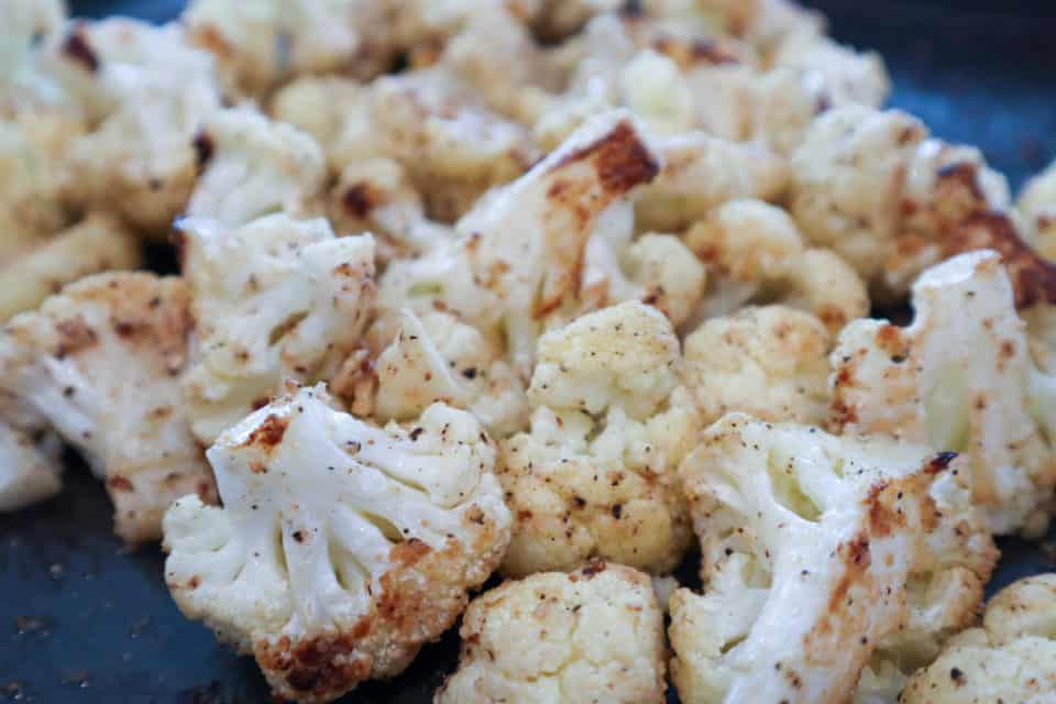 Picture of finished Oven Roasted Cauliflower on a baking sheet.