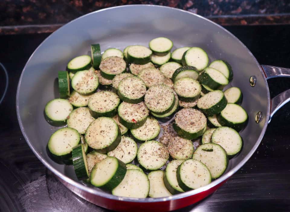 Picture of ingredients for Simple Sauteed Zucchini with Lemon in a skillet before cooking. 