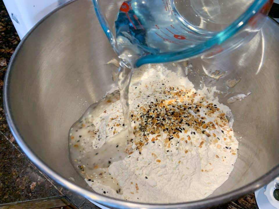 Picture of water being added to flour, starter and salt