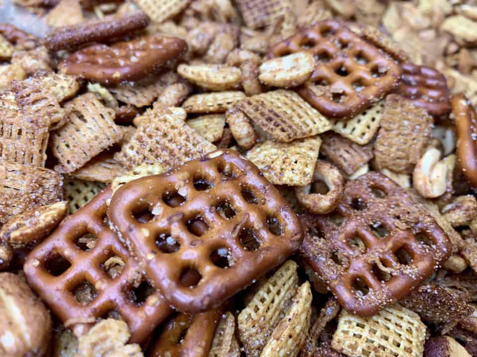 Baked Savory Chex Mix cooling on a baking sheet (close up).