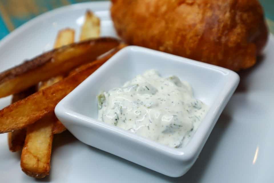 Small side dish of Quick & Easy Tartar Sauce beside fish & fries
