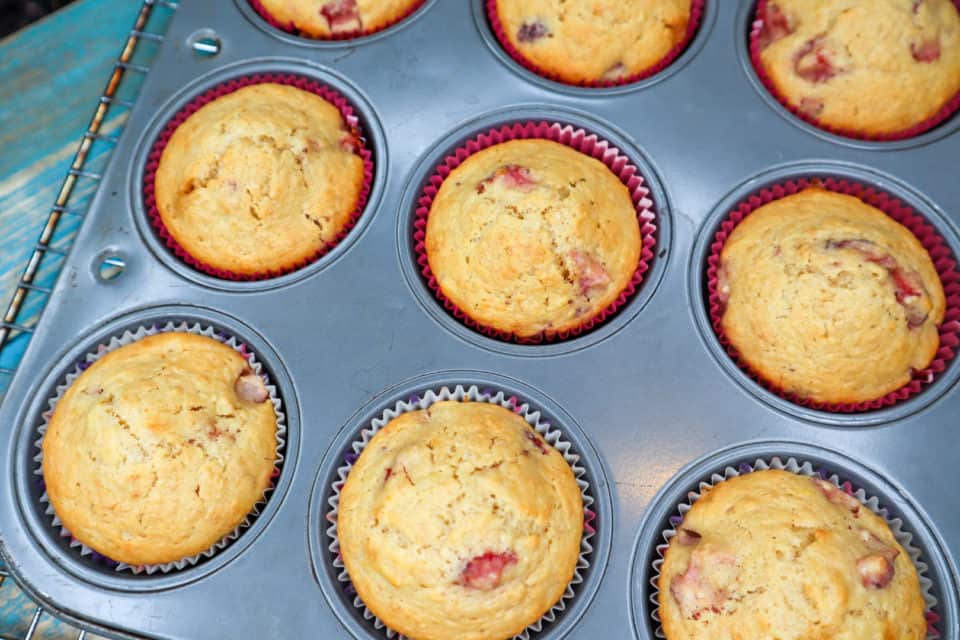 Picture of baked Strawberry Banana Oat Bran Muffins in muffin tin