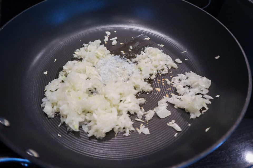 Picture of onions being cooked for Baked Chicken Enchiladas.
