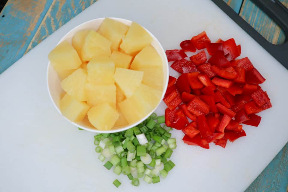 Picture of fruit and vegetable elements for Pineapple BBQ Chicken Foil Packs.