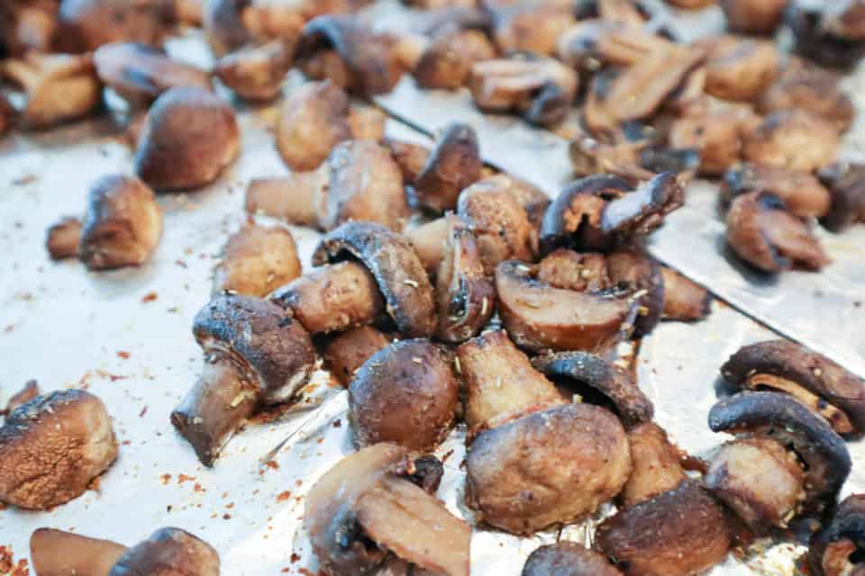 Close up of Savory Baked Mushrooms on the baking sheet after cooking