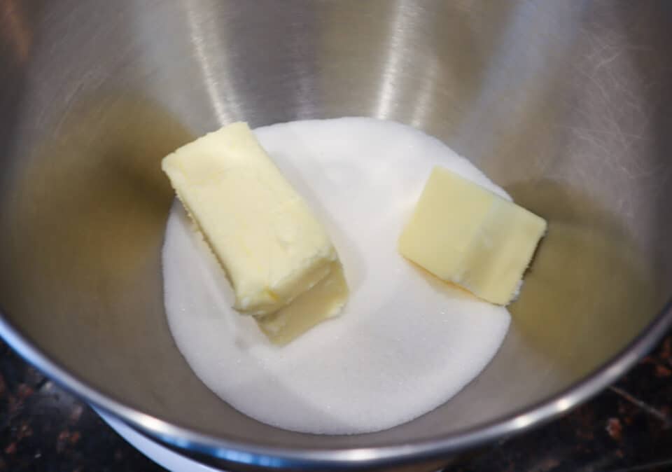 Butter and sugar in a bowl prior to mixing.