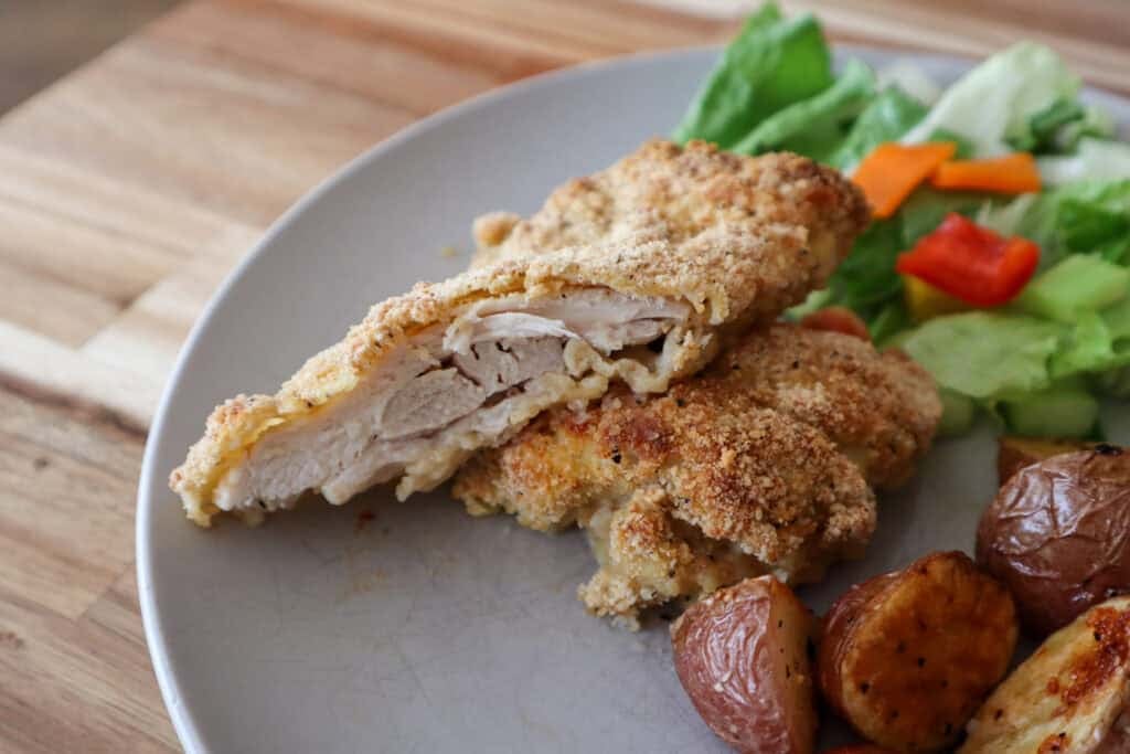 Finished Dill Pickle Chicken Thighs on a plate, ready to eat. 