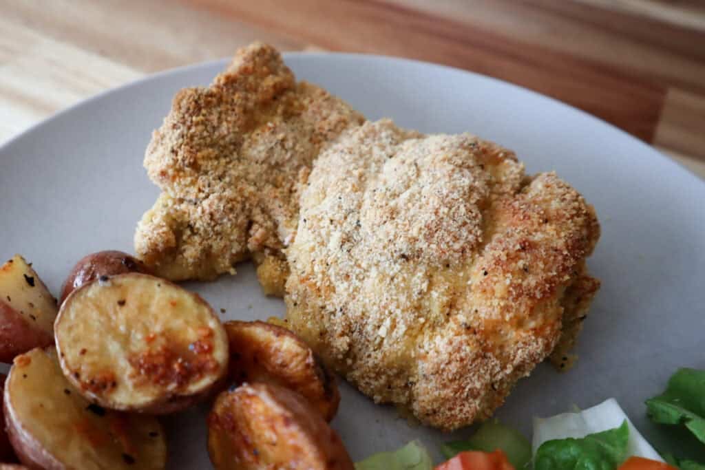 Finished Dill Pickle Chicken Thighs on a plate, ready to eat. 