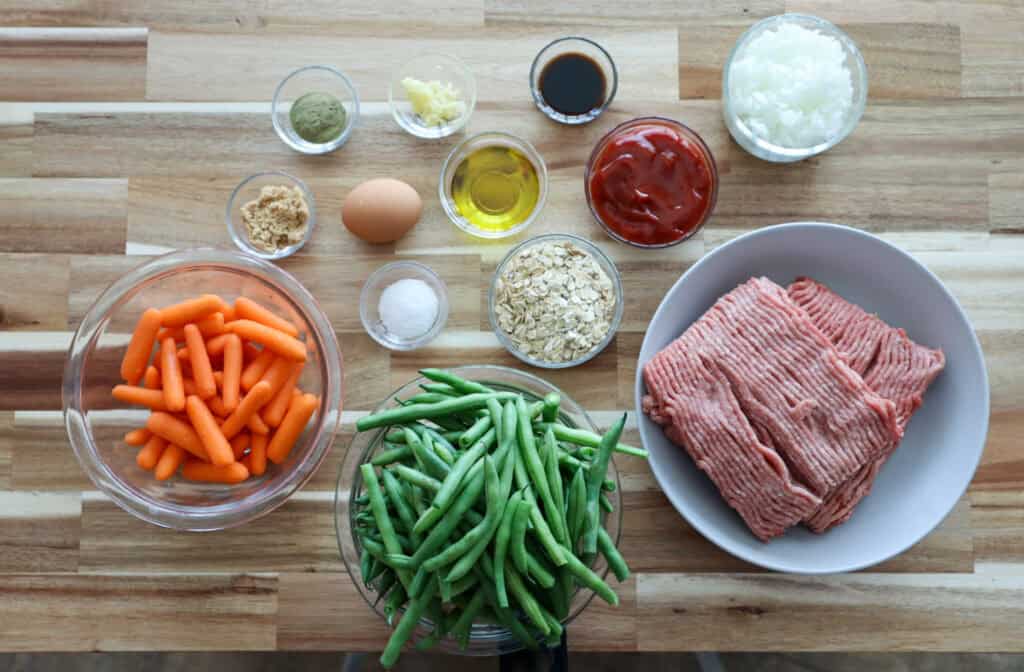 Ingredients for Glazed Mini Turkey Meatloaf Dinner on a board.