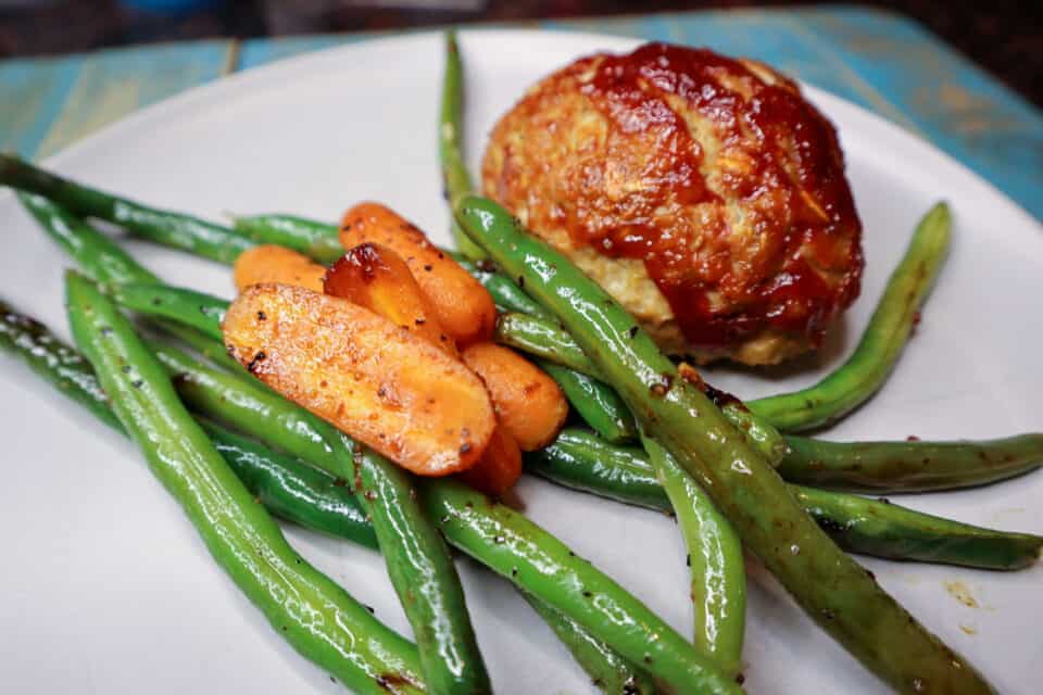 Finished Glazed Mini Turkey Meatloaf Dinner on a plate.